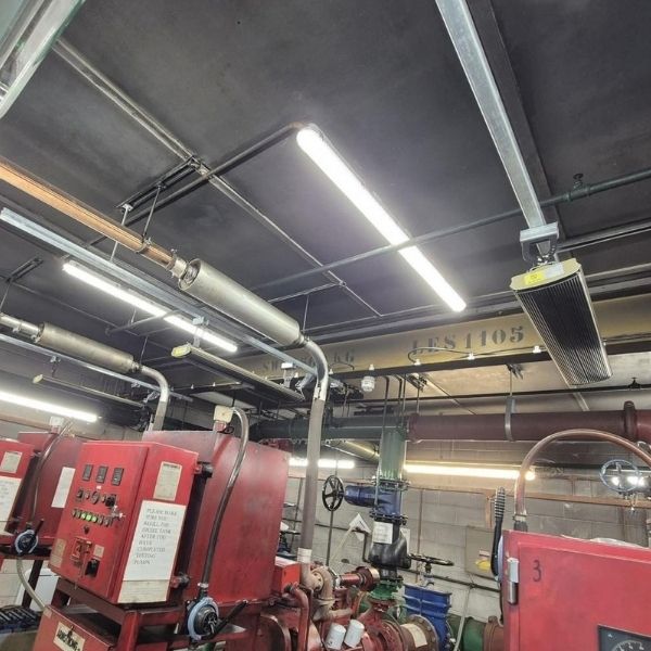 Industrial workshop fitted with commercial LED lighting for improved visibility and energy efficiency