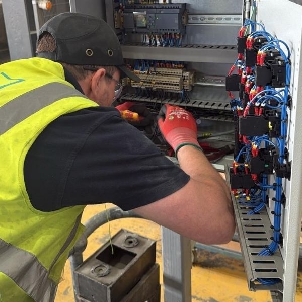 Reactive Electrical Maintenance Repair Nova Electrical engineer carrying out reactive electrical maintenance on commercial electrical equipment